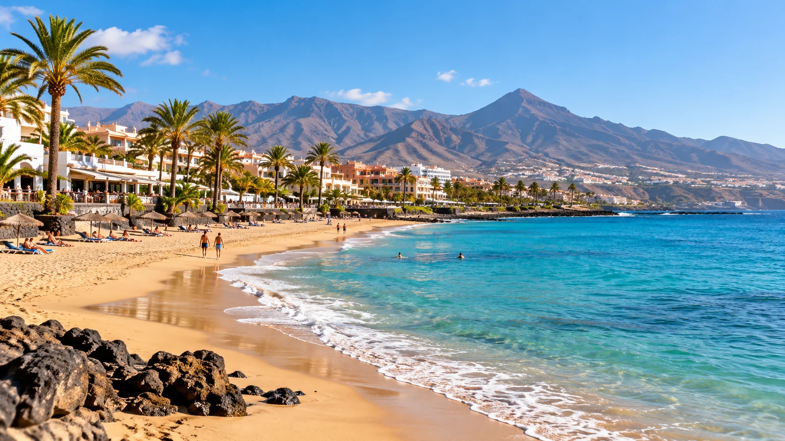 Palm-lined beach and Atlantic coastline in southern Tenerife