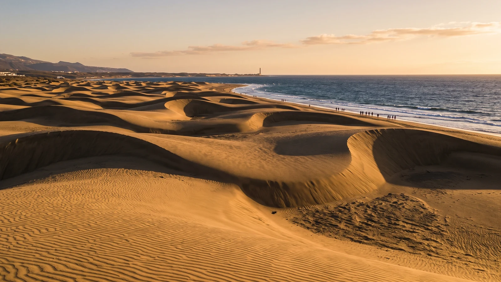 Golden Maspalomas dunes beside the Atlantic Ocean in Gran Canaria